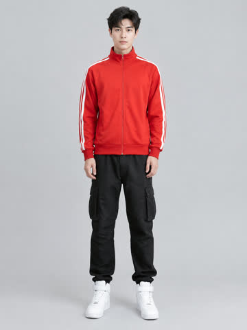 The stand-in: a man in a red track jacket, black trousers and white sneakers